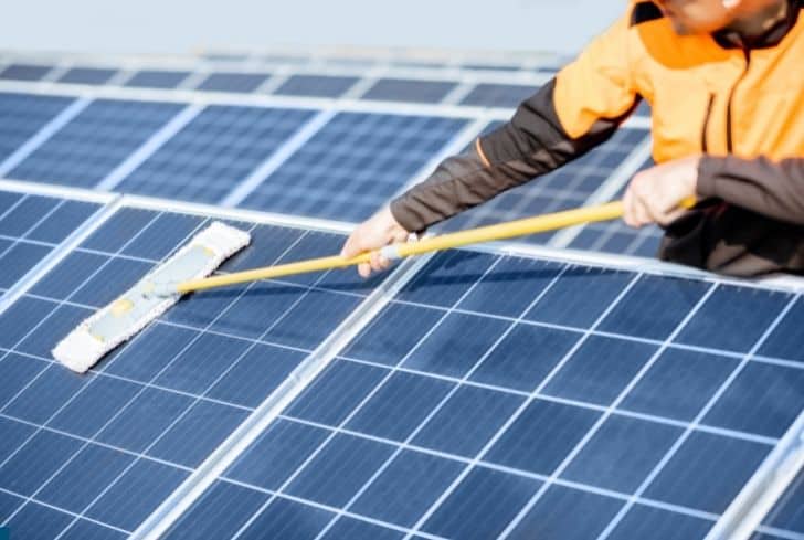 Professional cleaning of solar panels to ensure maximum energy efficiency and electricity production.